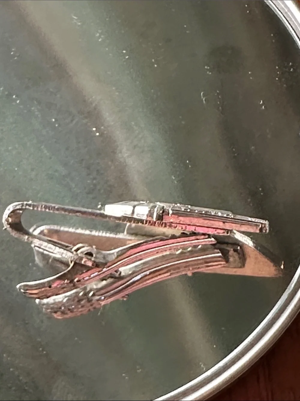 Vintage 60s Silver Tone Teletype tie clip manufactured by the Robbins Co.
